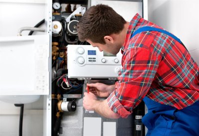 Technician repairing the heater