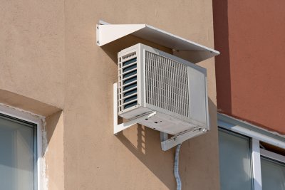 Air conditioner system units outside the home's wall
