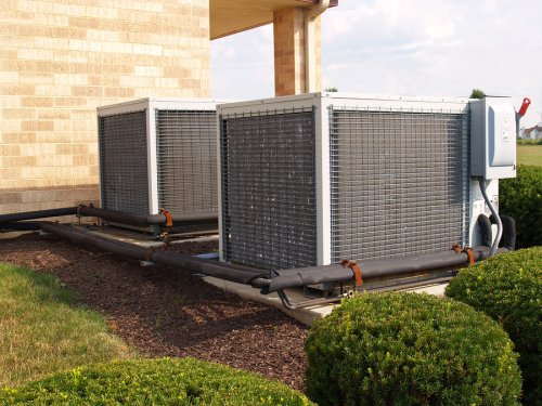 AC unit installed in the backyard of a house in Annapolis, MD