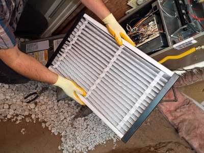 man handling air conditioner with dry ice