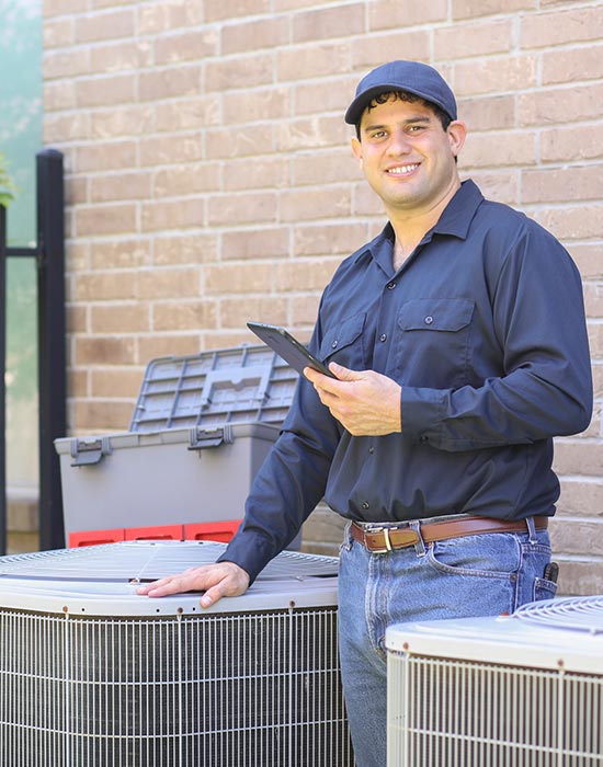 air conditioner repairman at work