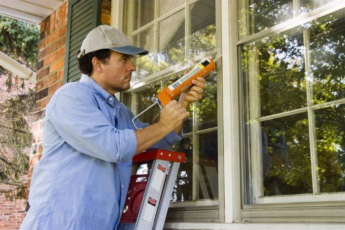Technician isolating the home's window